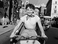 220px-Audrey_Hepburn_and_Gregory_Peck_on_Vespa_in_Roman_Holiday_trailer.jpg